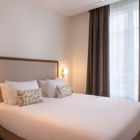 Le Lampika Hotel Paris Ruang foto