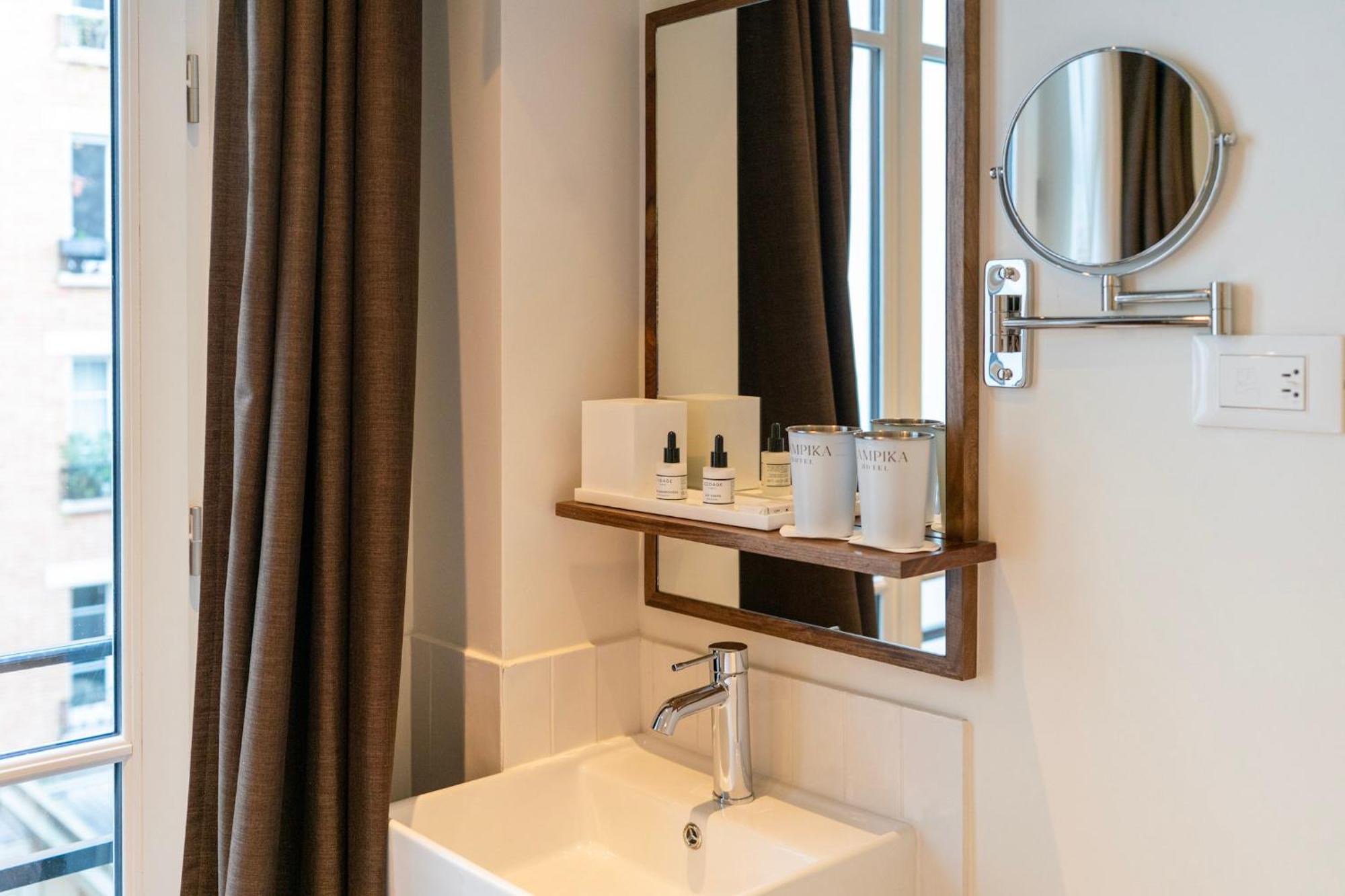 Le Lampika Hotel Paris Bagian luar foto